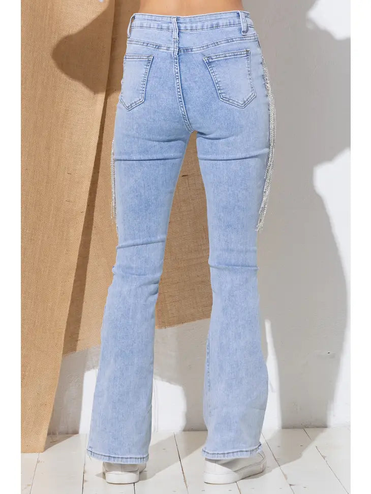Model wearing Shimmery As Can Be Denim Jeans in light blue, featuring a straight-leg fit with subtle shimmer finish and classic five-pocket design.