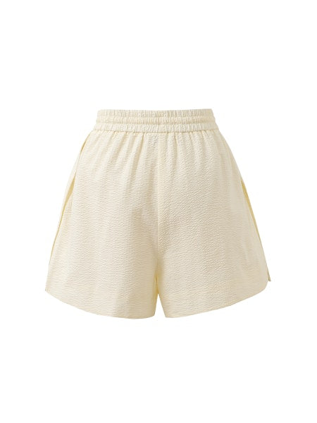 Back view of the Nala Shorts by FRNCH, showing the adjustable drawstring waistband and soft textured fabric, displayed on a plain white background