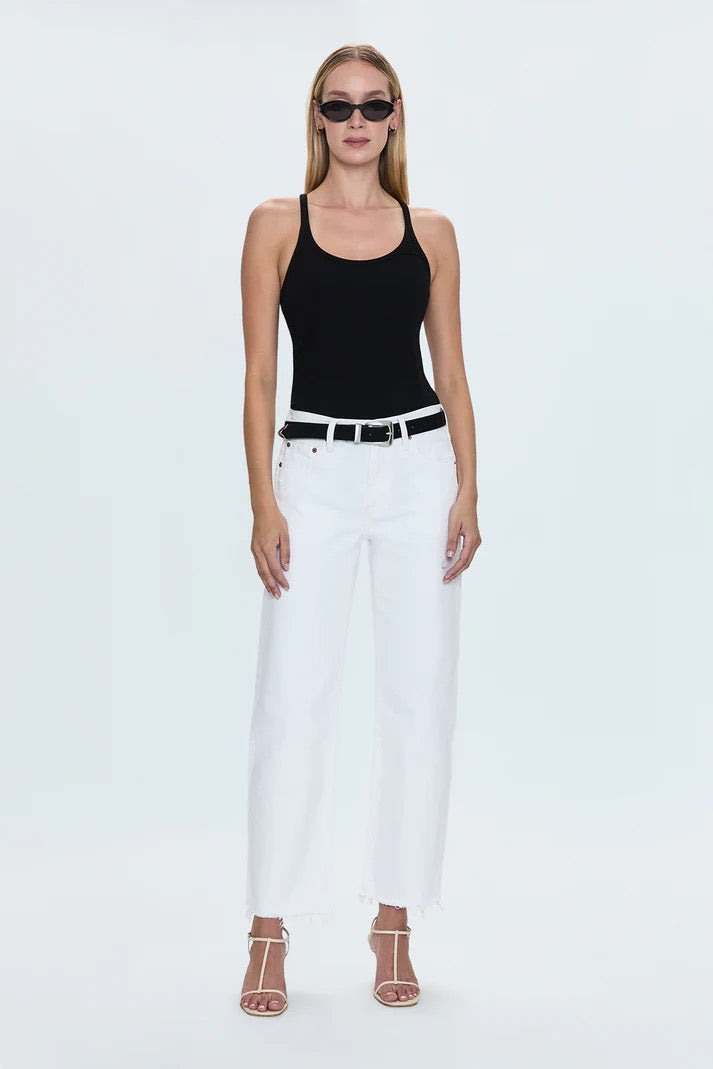 Woman wearing Pistola Lexi Mid Rise Wide Leg Trouser in Luxe White with black tank and sunglasses