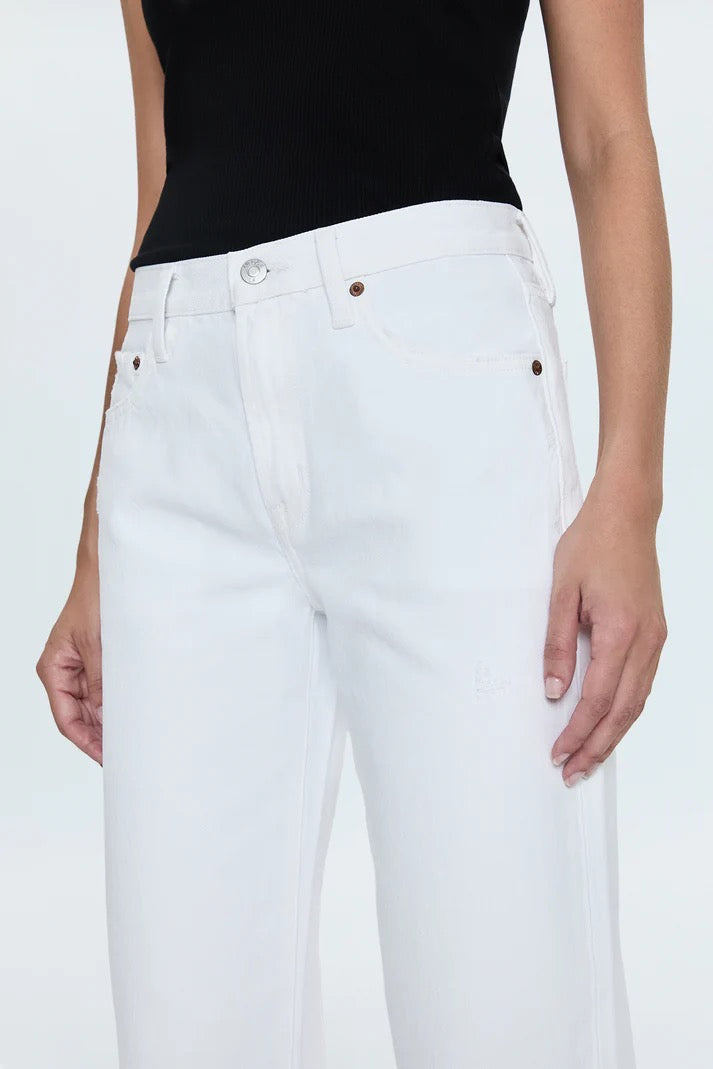 Close-up of front pockets and mid-rise waistband on white Pistola Lexi jeans