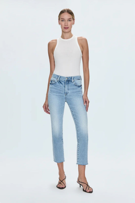 Woman wearing Pistola Monroe Crop High Rise Cigarette Jean in Strive with a white tank and black heels
