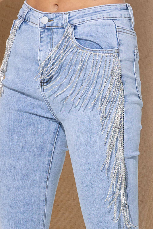 Model wearing Shimmery As Can Be Denim Jeans in light blue, featuring a straight-leg fit with subtle shimmer finish and classic five-pocket design.